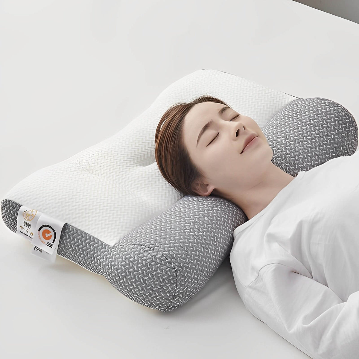 Almohada ortopédica contorneada de espuma viscoelástica transpirable e hipoalergénica para soporte cervical