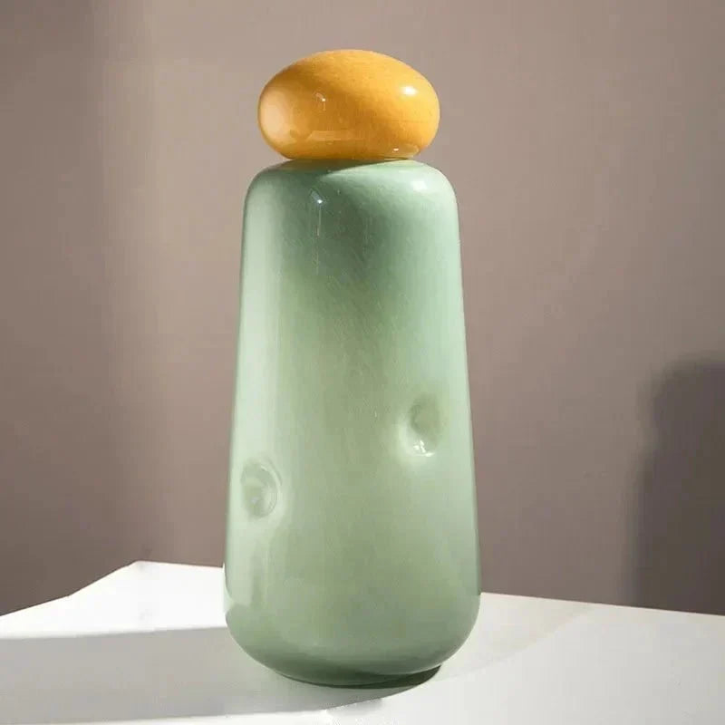 Jarrón de flores elíptico de vidrio brillante con tapa de guijarro