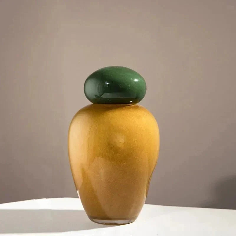 Jarrón de flores elíptico de vidrio brillante con tapa de guijarro