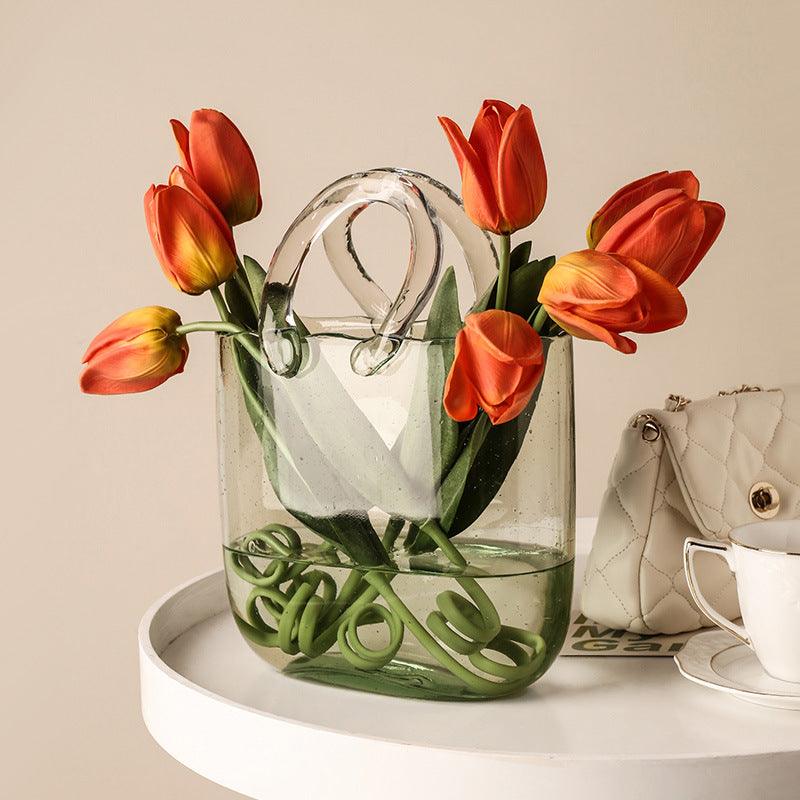 Jarrón decorativo de flores de vidrio transparente con silueta escultórica de bolso