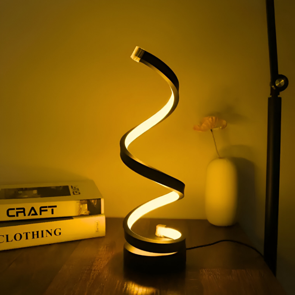 Lámpara de escritorio escultórica con pinza ajustable y diseño en espiral
