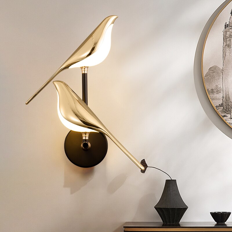Aplique de pared magnético ajustable con silueta escultórica de pájaro