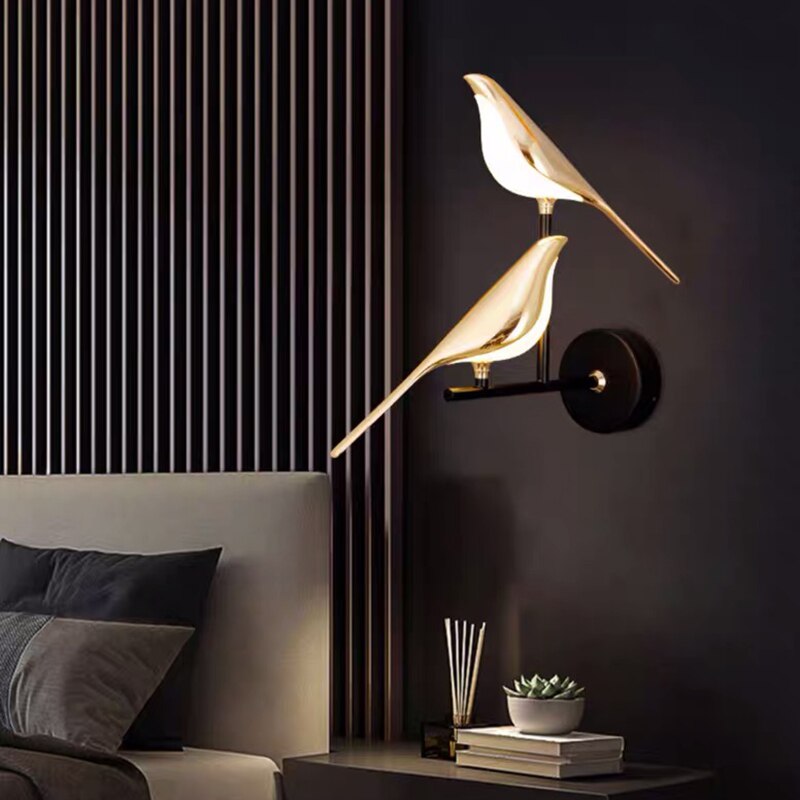 Aplique de pared magnético ajustable con silueta escultórica de pájaro