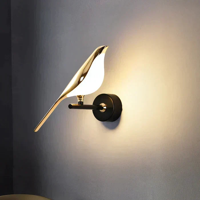 Aplique de pared magnético ajustable con silueta escultórica de pájaro