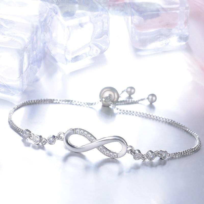 Pulsera minimalista artesanal ajustable de cadena de plata con símbolo de infinito