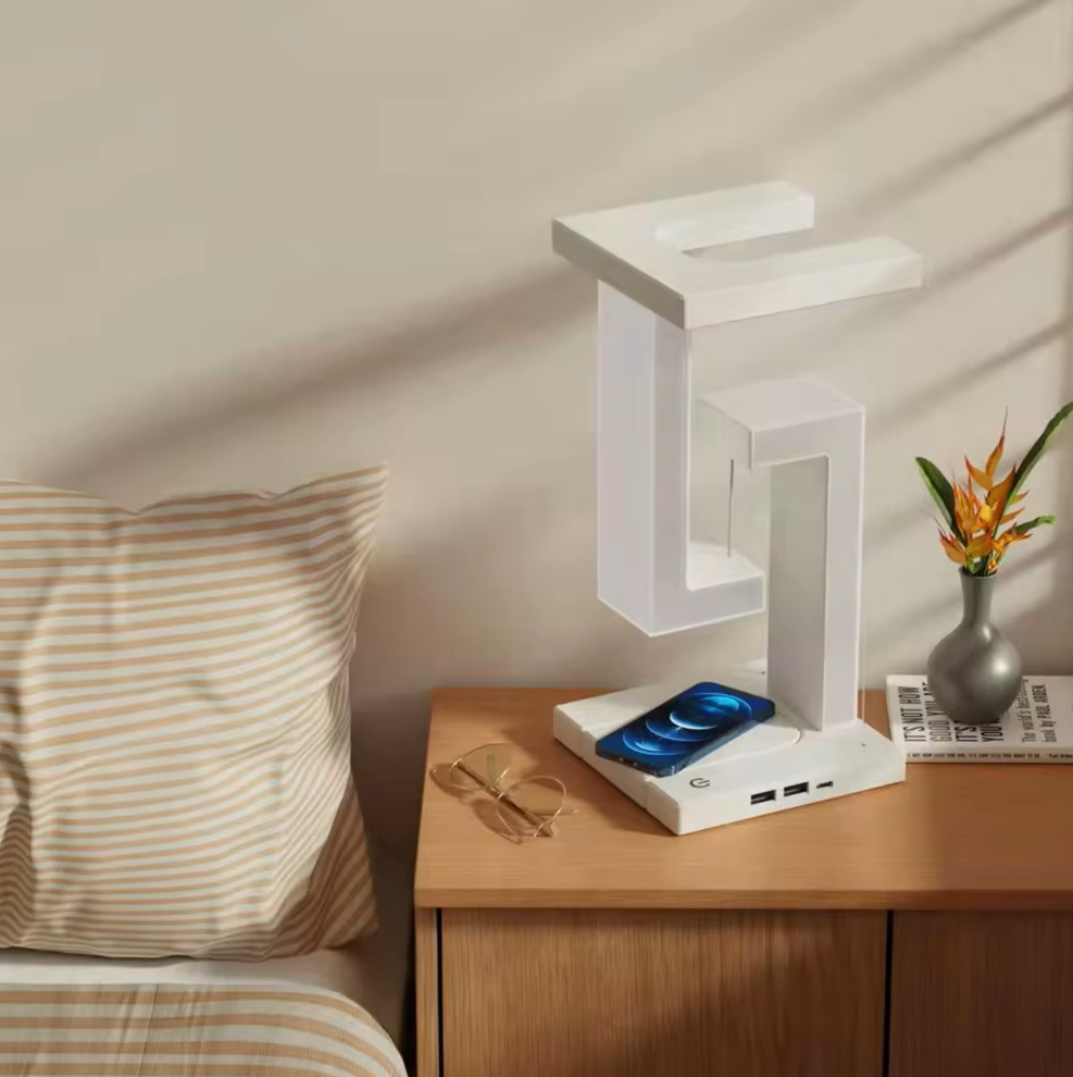 Lámpara de mesa con iluminación de zona flotante y carga inalámbrica