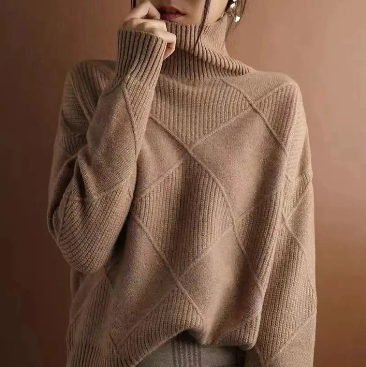 Suéter de punto de rombos para mujer con cuello alto y corte holgado