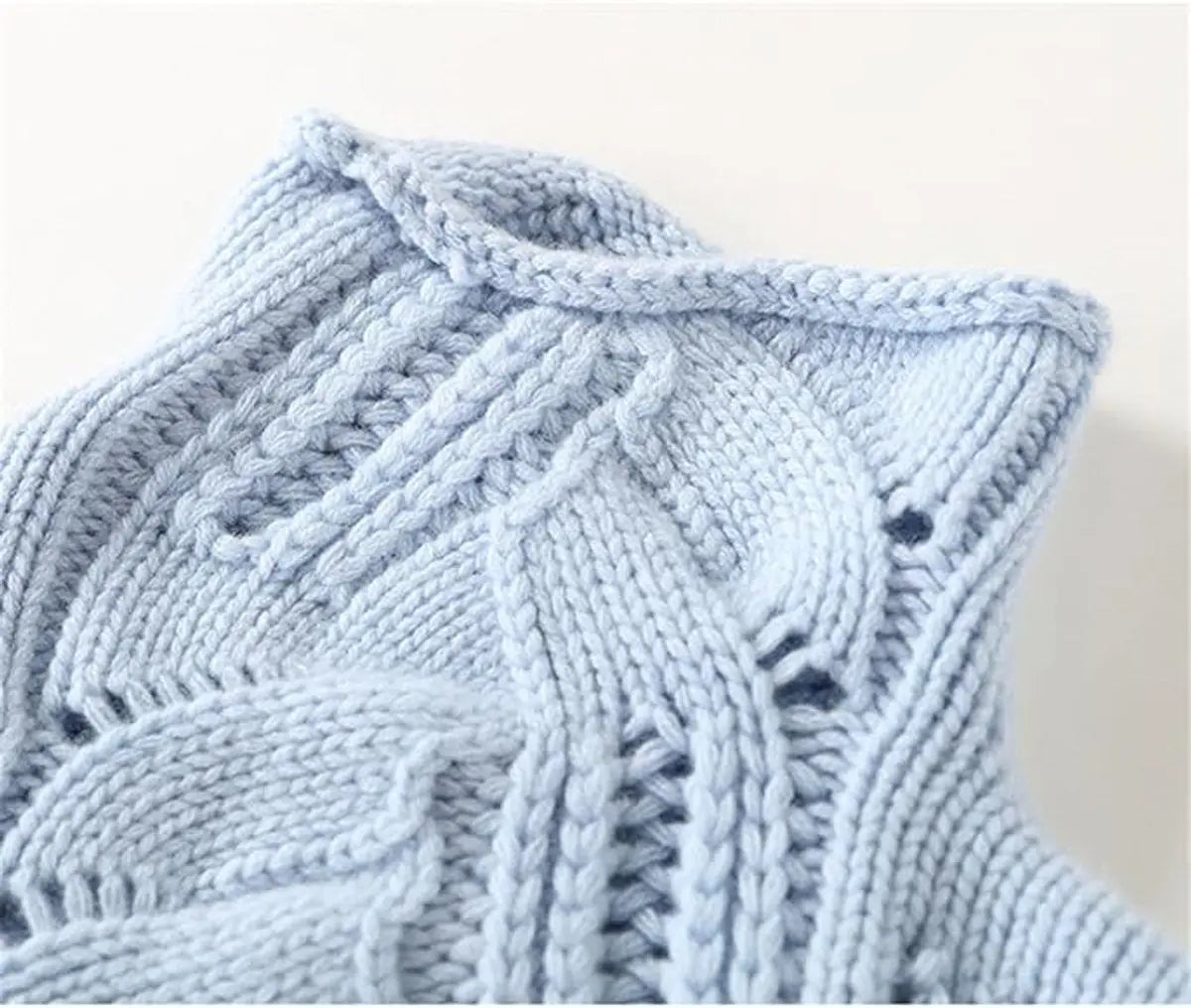 Jersey de punto trenzado para mujer con cuello alto y corte holgado