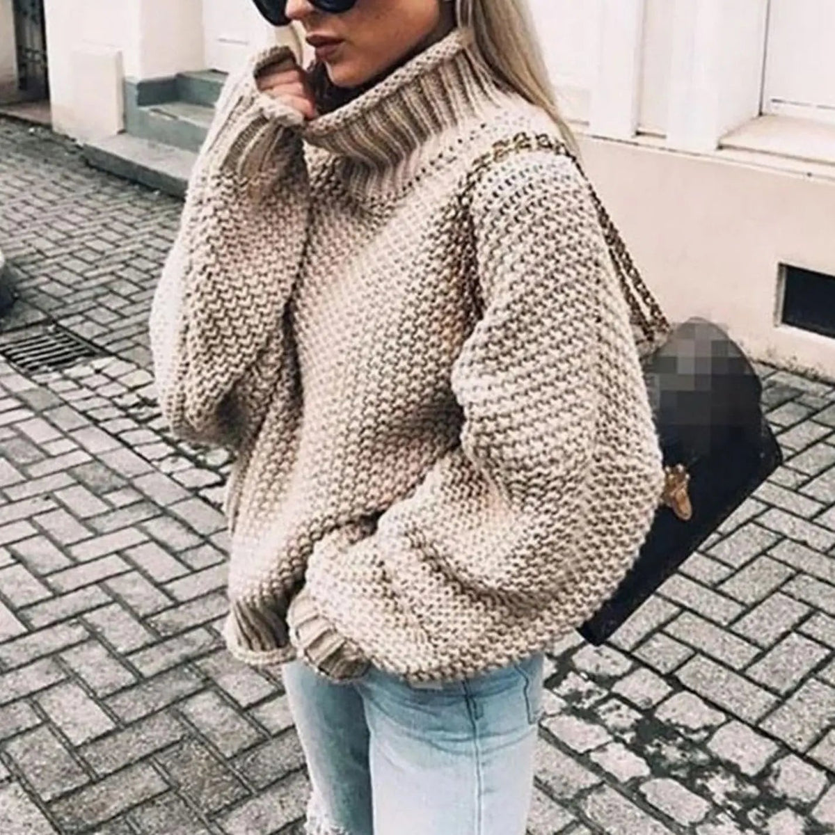 Jersey oversize de punto grueso para mujer con cuello alto