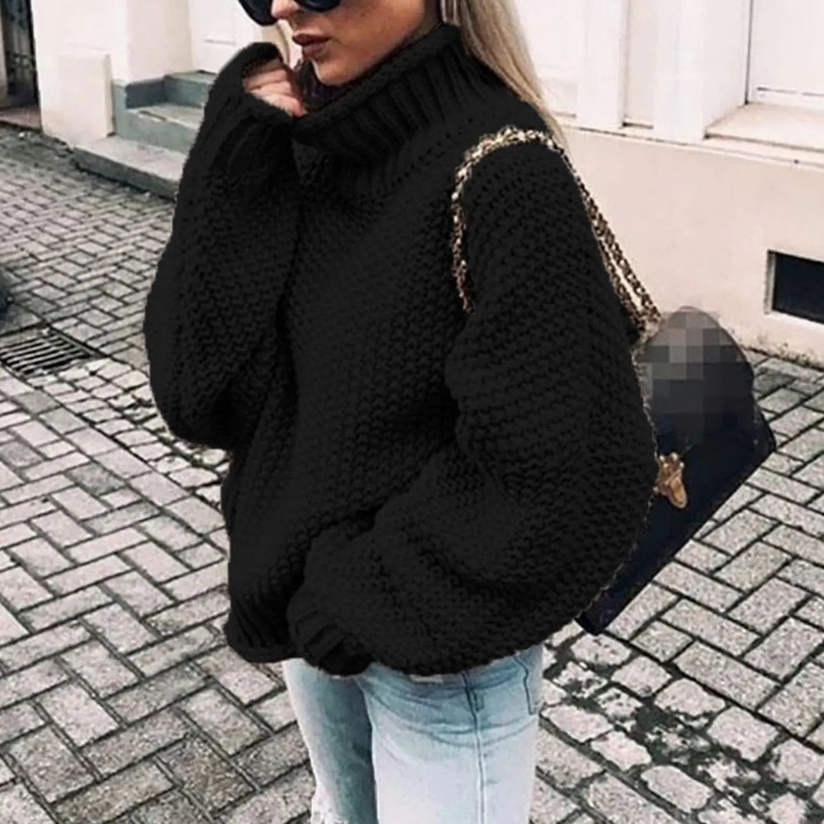 Jersey oversize de punto grueso para mujer con cuello alto