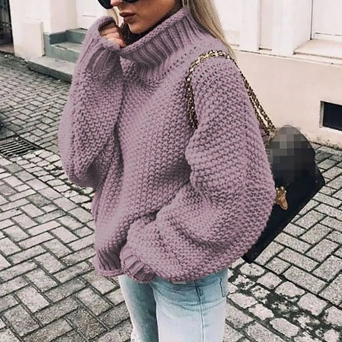 Jersey oversize de punto grueso para mujer con cuello alto