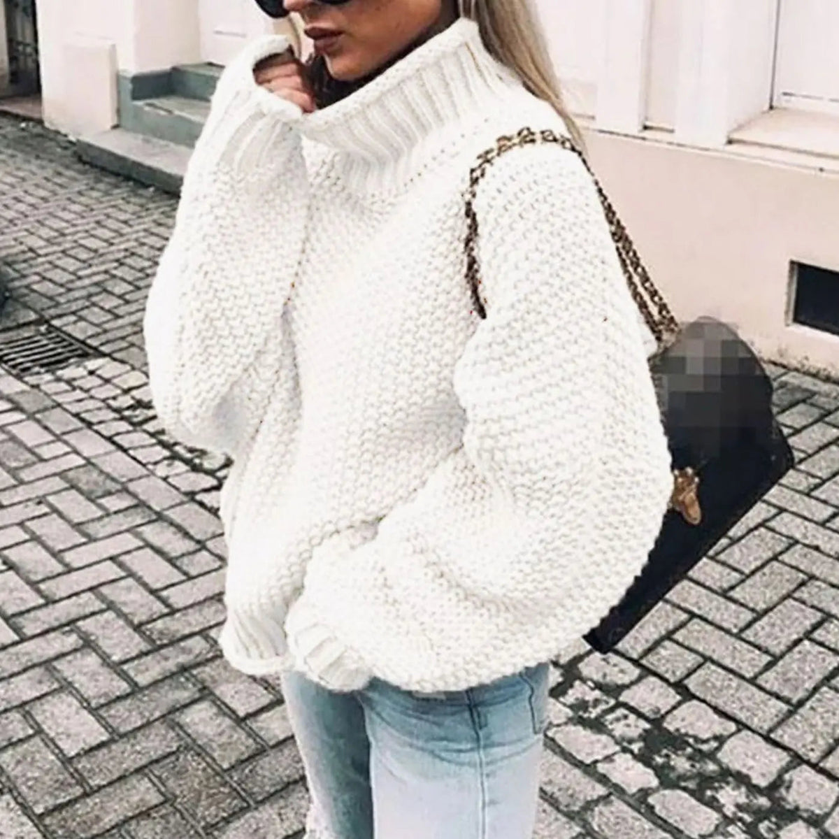 Jersey oversize de punto grueso para mujer con cuello alto