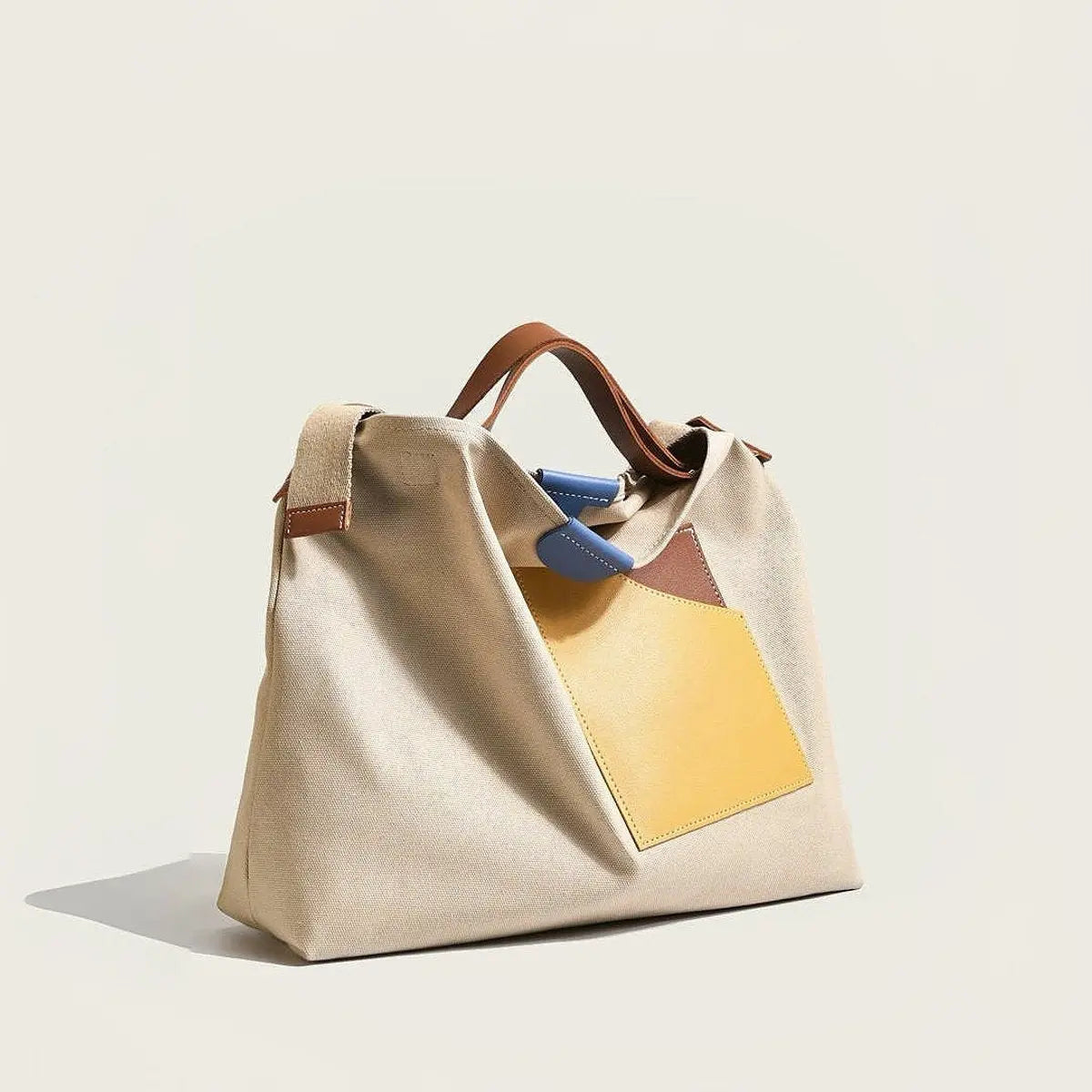 Bolso tote de lona para mujer con bloques de color, bolsillo de cuero PU y asa para el hombro