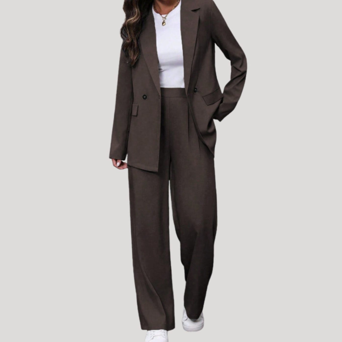Traje de pantalón de mujer de sastrería con doble botonadura y pierna ancha