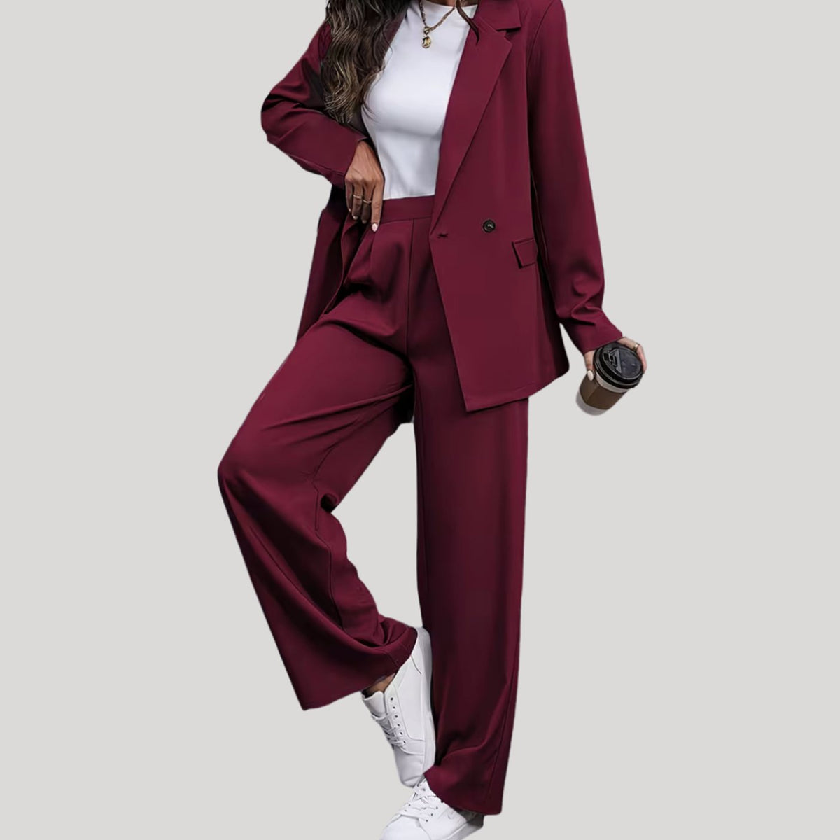 Traje de pantalón de mujer de sastrería con doble botonadura y pierna ancha