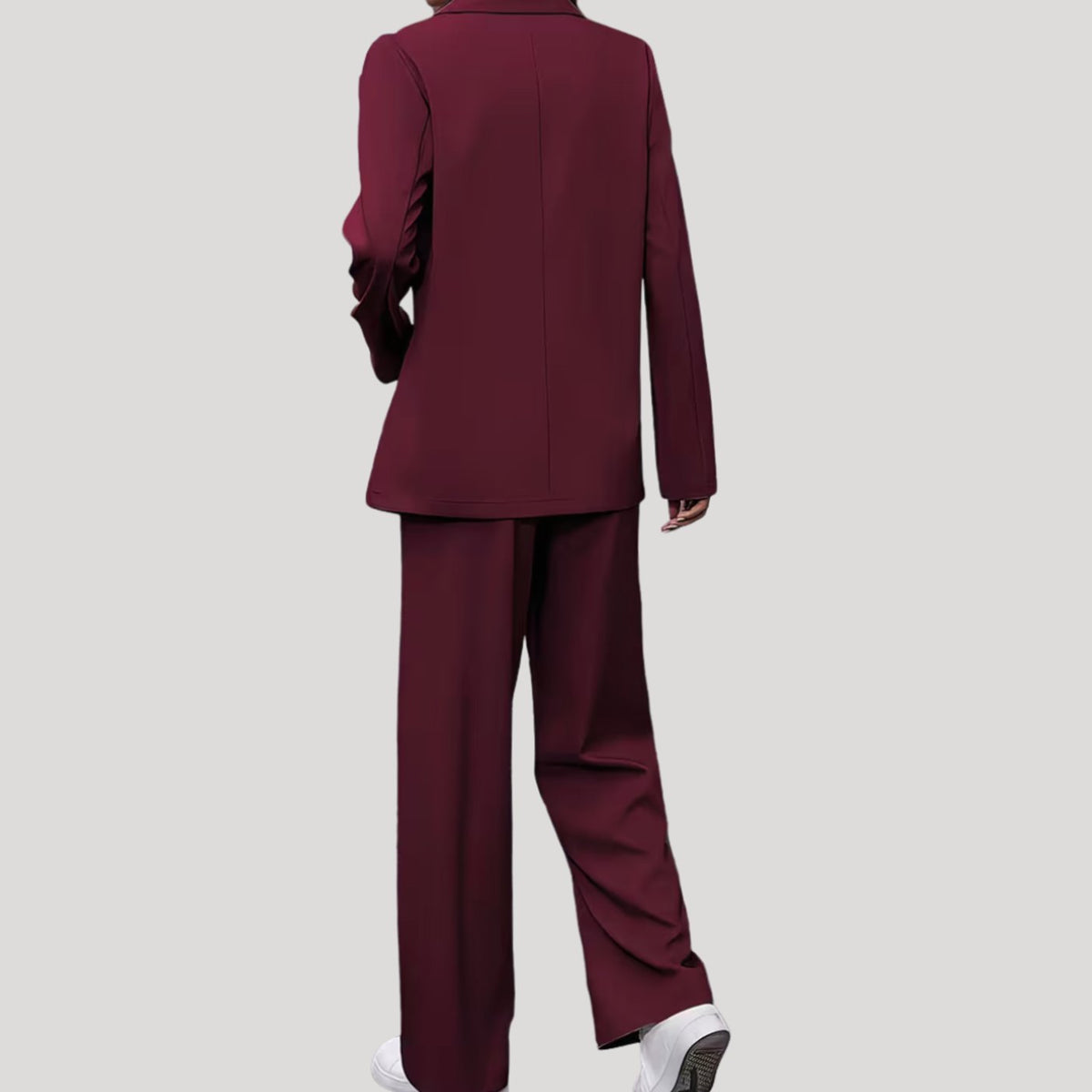 Traje de pantalón de mujer de sastrería con doble botonadura y pierna ancha