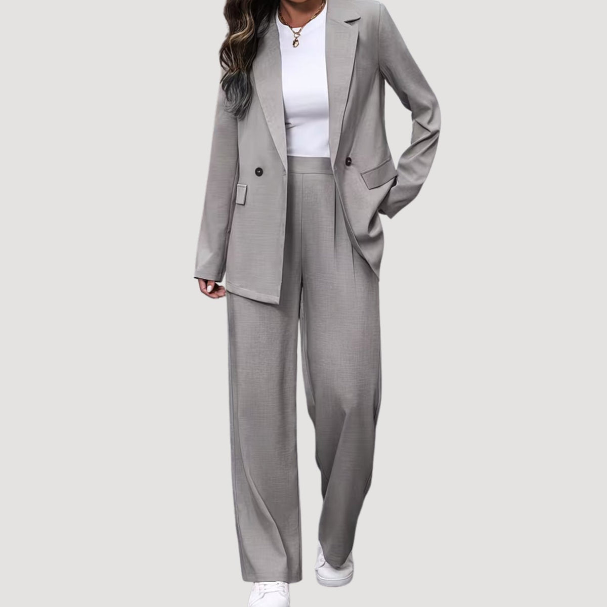 Traje de pantalón de mujer de sastrería con doble botonadura y pierna ancha