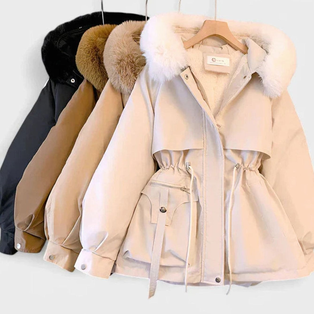 Chaqueta acolchada elegante de invierno de mujer con capucha de piel sintética y cintura ajustable con cordón