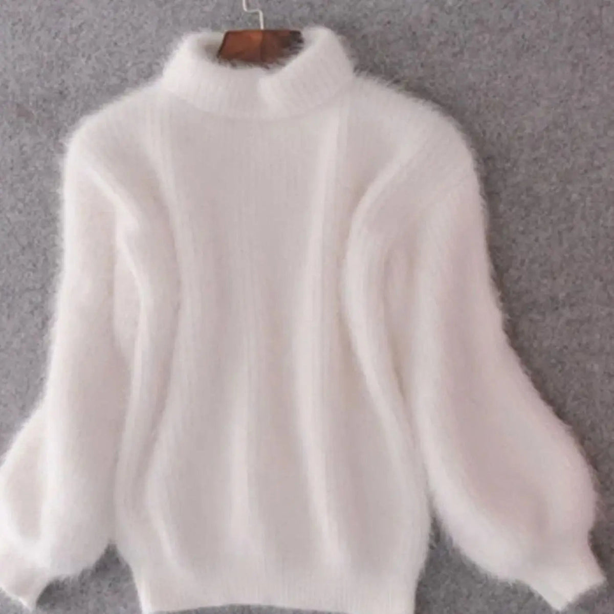Jersey de punto holgado y mullido de cuello alto para mujer