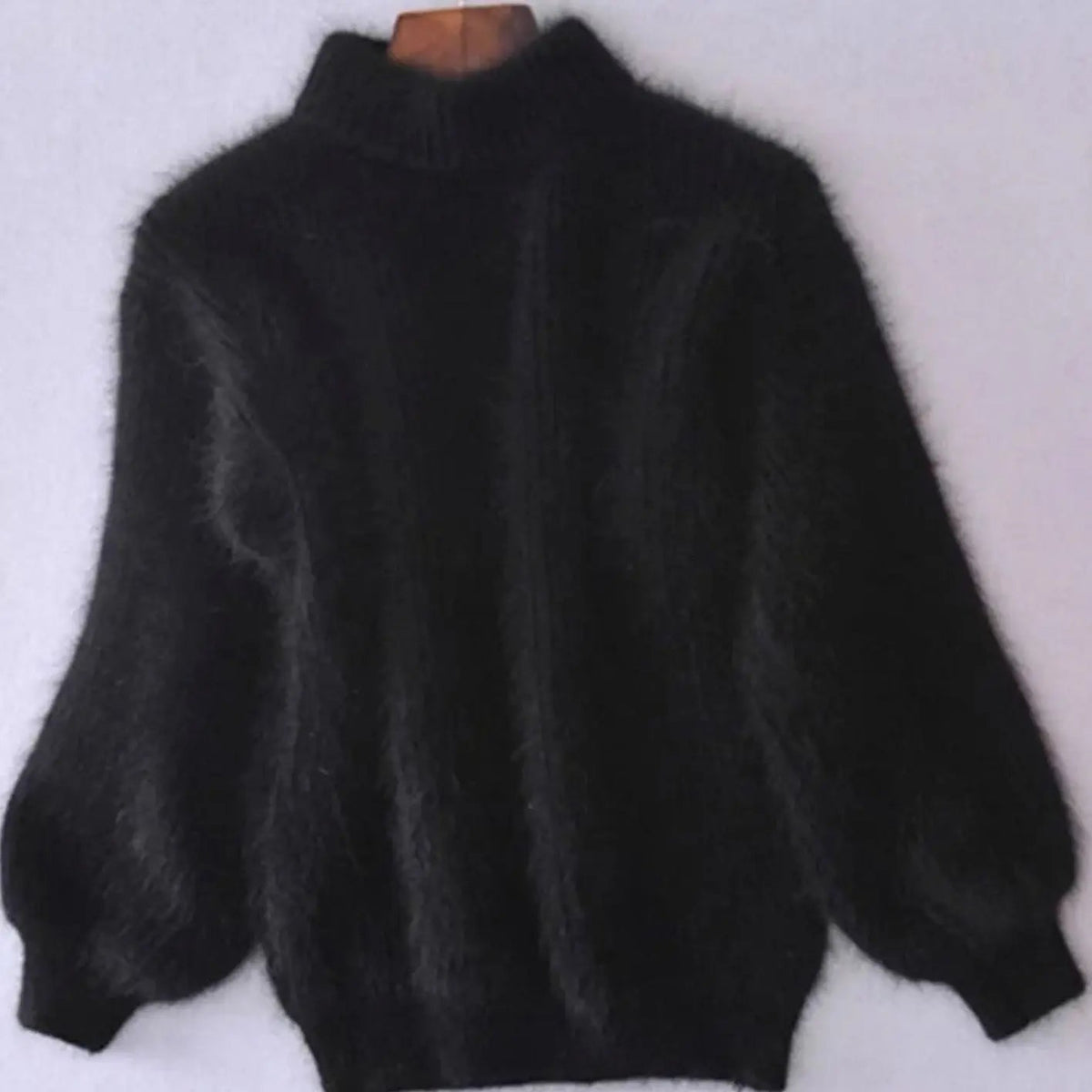 Jersey de punto holgado y mullido de cuello alto para mujer