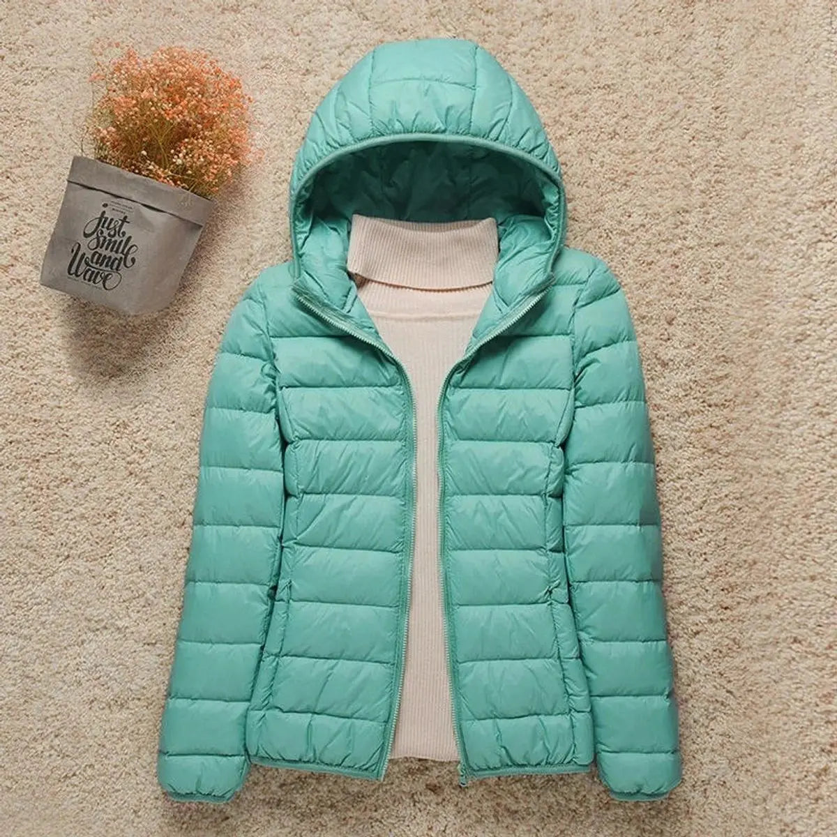 Chaqueta ligera acolchada con capucha, relleno de plumón y plegable para mujer