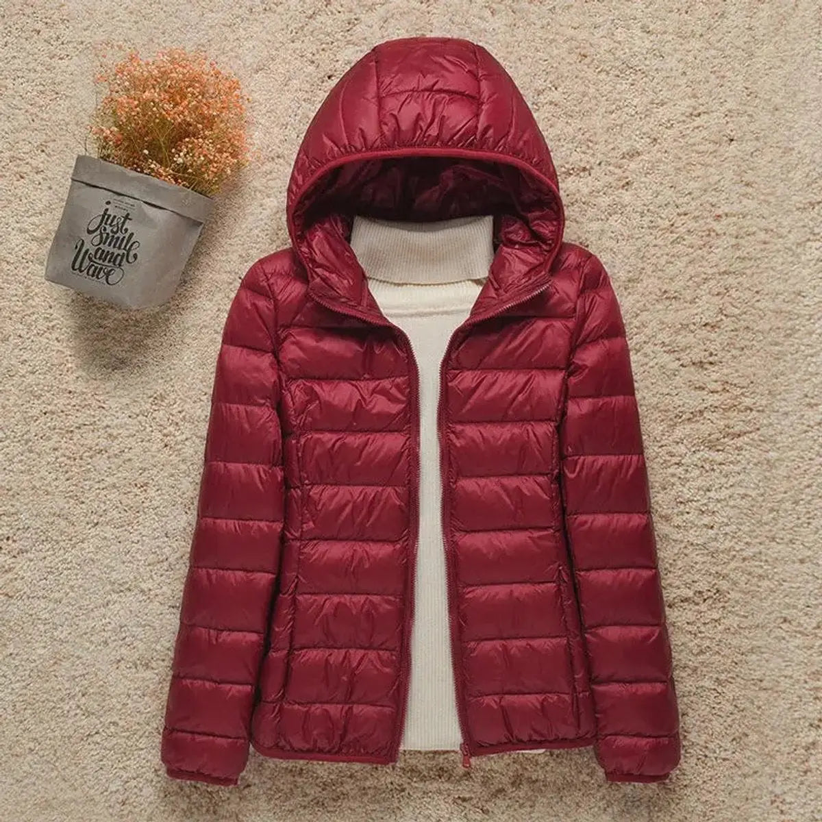 Chaqueta ligera acolchada con capucha, relleno de plumón y plegable para mujer