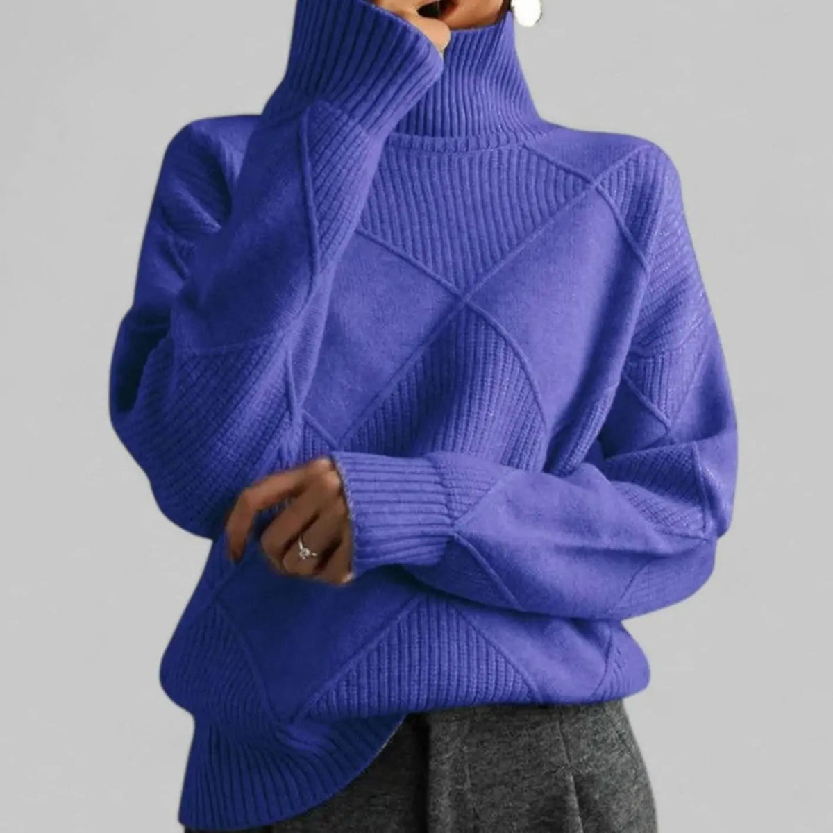 Suéter extragrande de punto de rombos con cuello alto para mujer