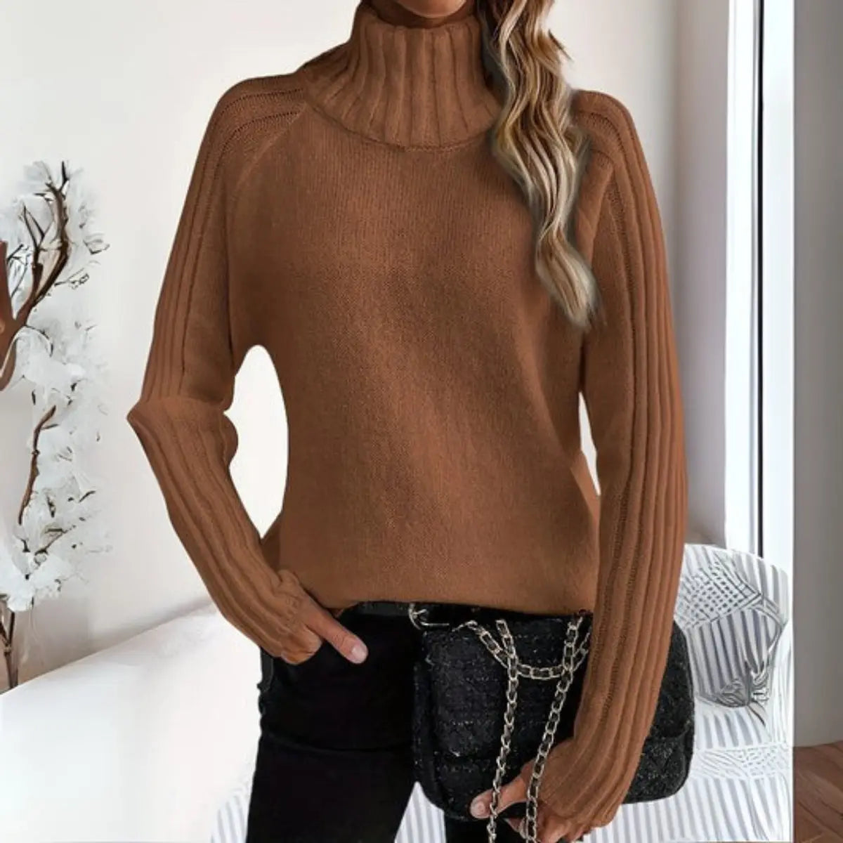 Jersey de punto acanalado de cuello alto y corte holgado para mujer