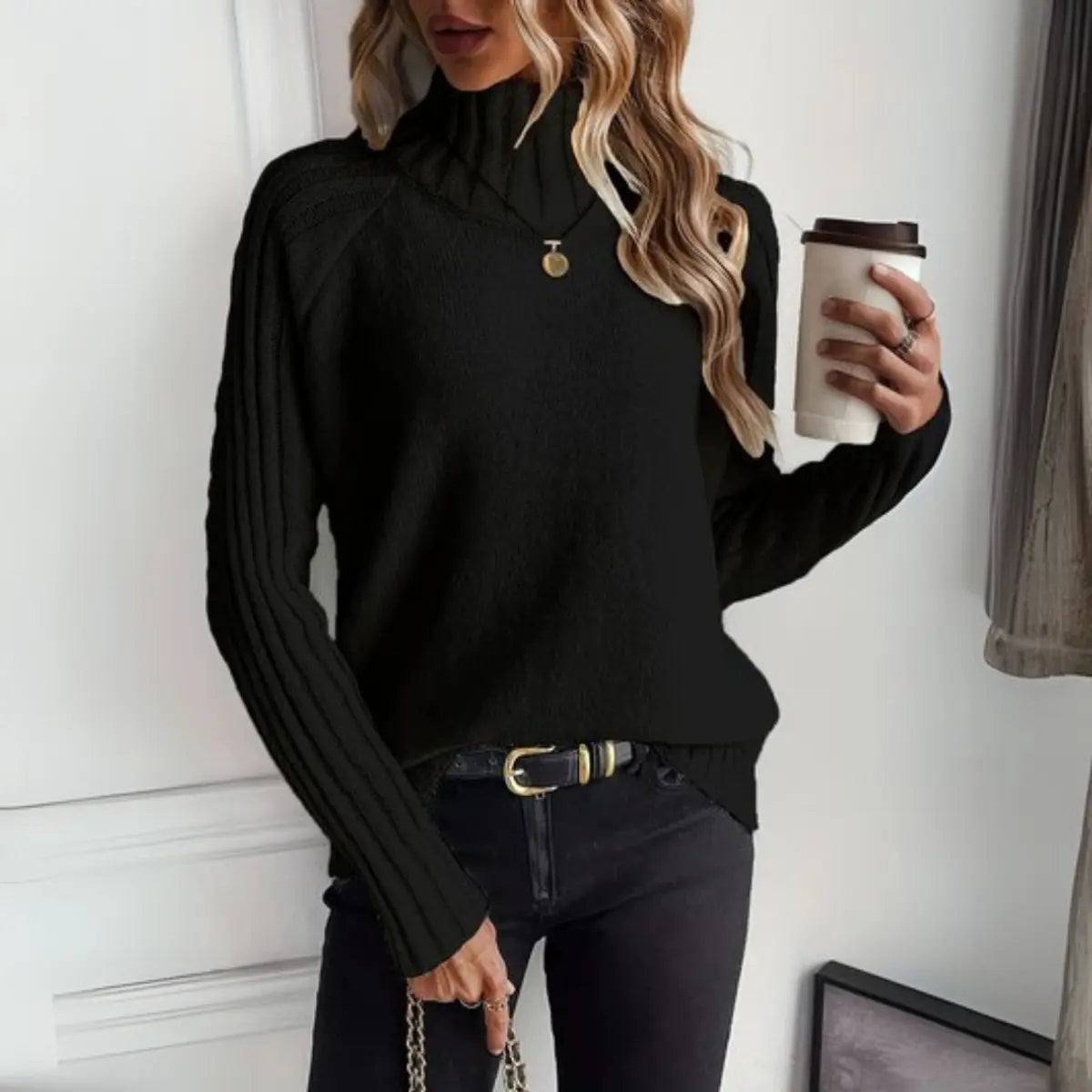 Jersey de punto acanalado de cuello alto y corte holgado para mujer