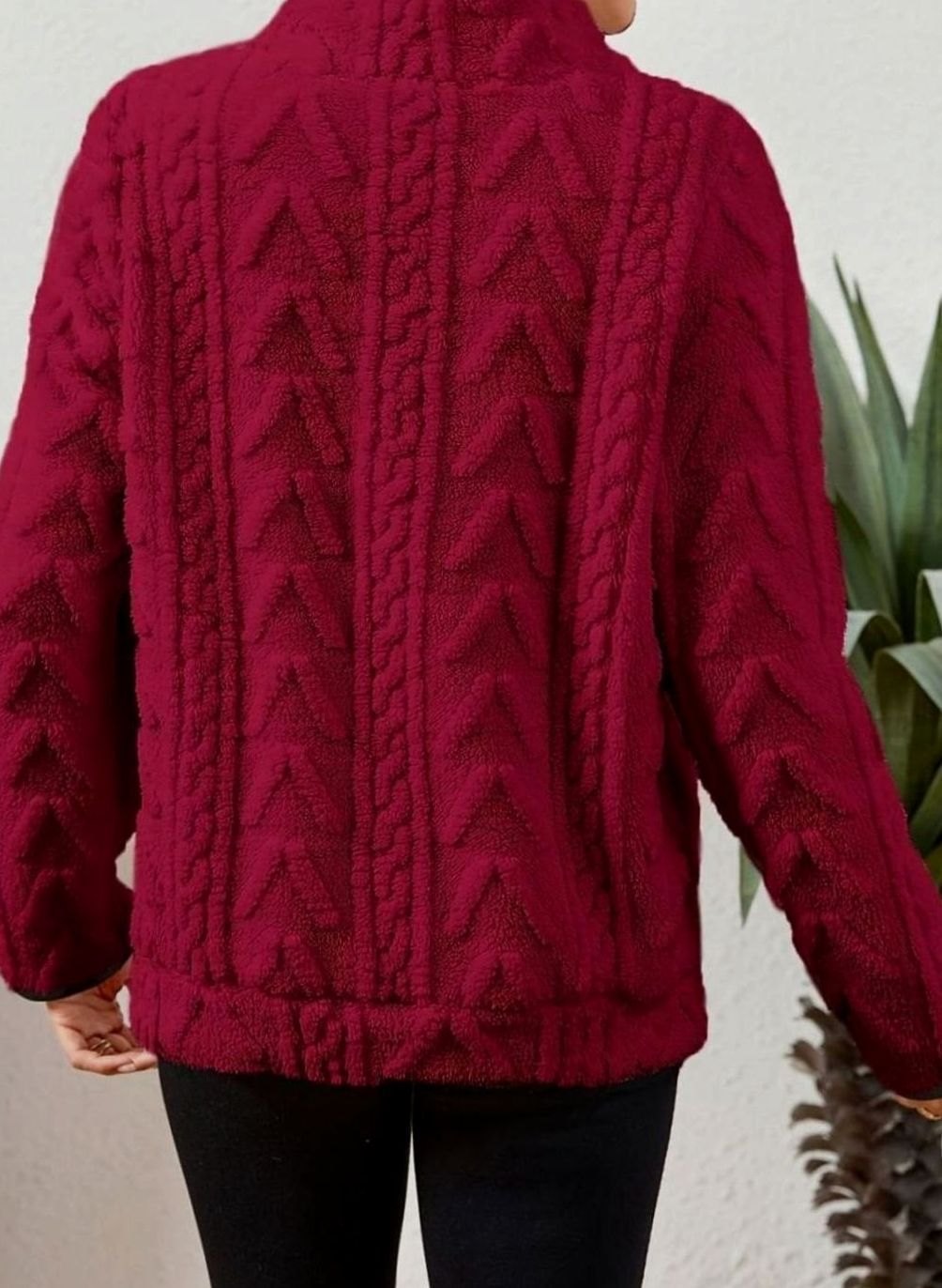 Jersey polar texturizado de manga larga con media cremallera y bolsillo tipo canguro para mujer