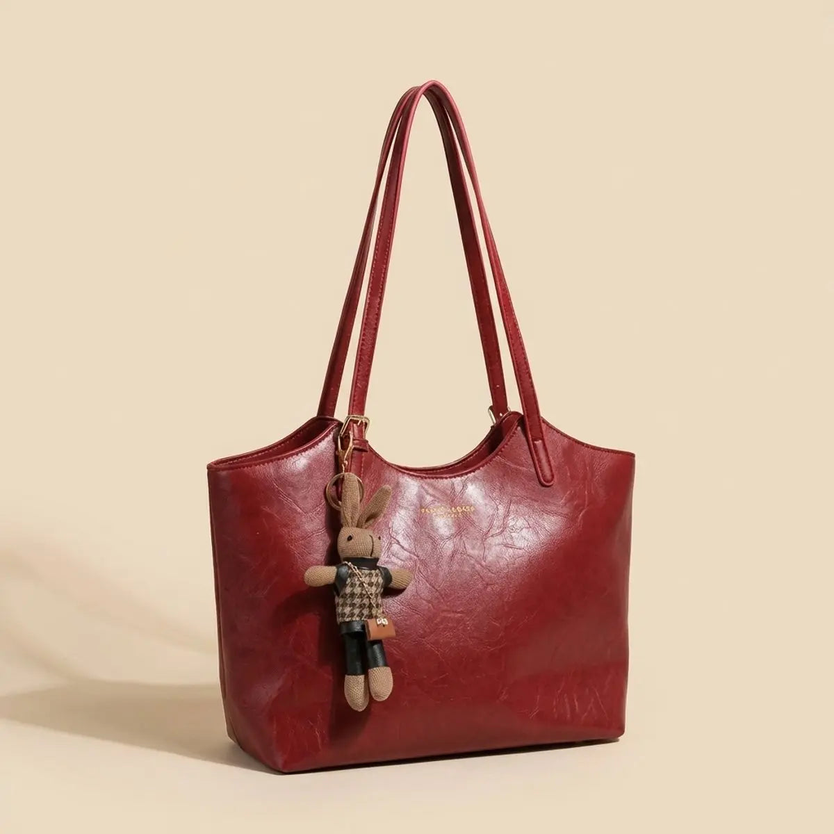 Bolso tote de hombro de cuero vegano para mujer con adorno de conejito de felpa