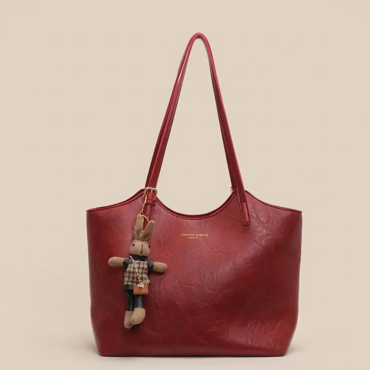 Bolso tote de hombro de cuero vegano para mujer con adorno de conejito de felpa